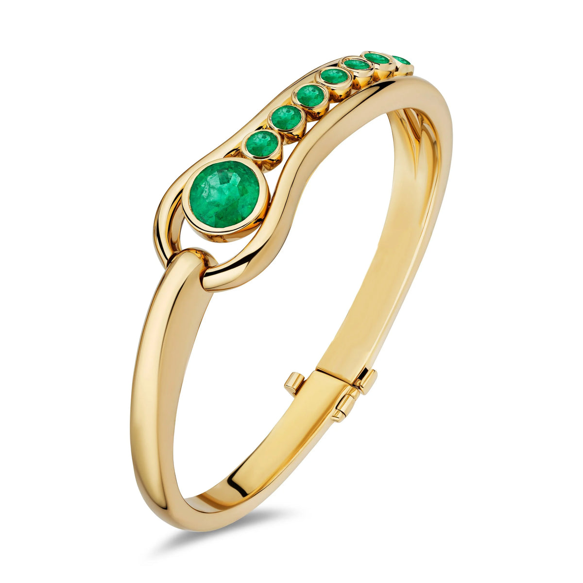 A polished yellow gold hinged bangle bracelet featuring a curved top plate set with a large round green emerald and five smaller round green emerald stones, shown on a clean white background.