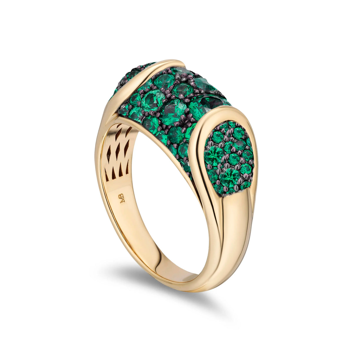 A yellow gold ring featuring a curved top set with pavé green gemstones, photographed on a clean white background.