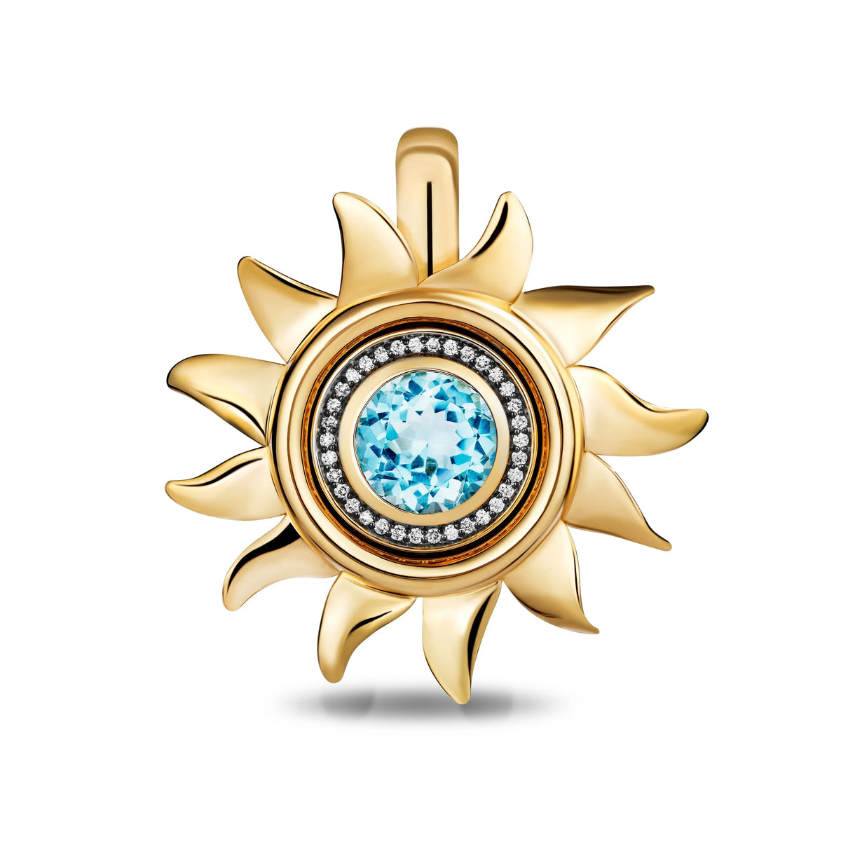 A gold sun pendant featuring a central light blue gemstone surrounded by a halo of small clear stones, set against a plain white background.