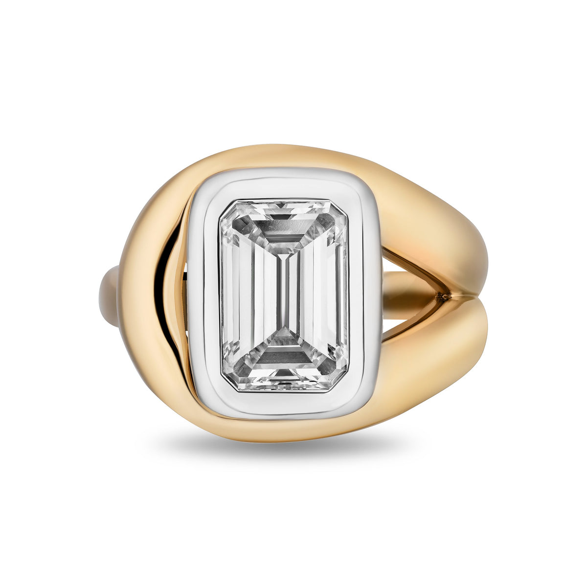 A two-tone ring featuring a large rectangular emerald-cut diamond in a white gold bezel, set on a polished yellow gold band with a lasso design, shown on a white background.