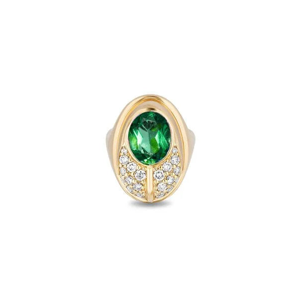 A gold signet ring featuring a prominent oval-cut green emerald gemstone, surrounded by a halo of small pavé-set diamonds, shown on a plain white background.