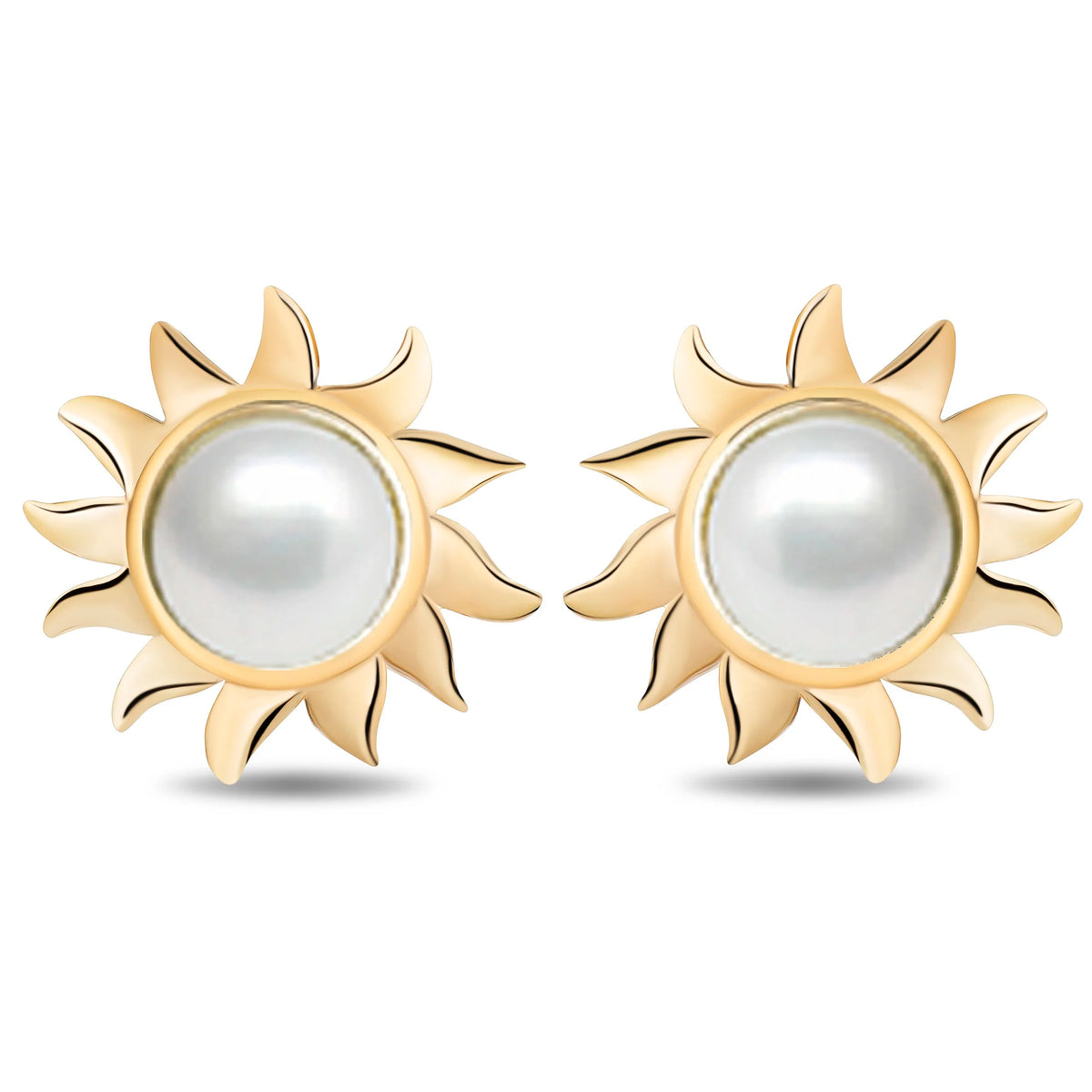 A pair of gold sunburst stud earrings with oval white pearl centers, shown on a clean white background.
