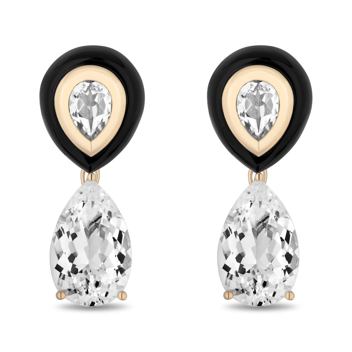 A pair of drop earrings featuring pear-cut clear gemstones suspended below a heart-shaped setting with a black outer halo, a gold inner halo, and a smaller pear-cut clear stone at the center, shown on a plain white background.