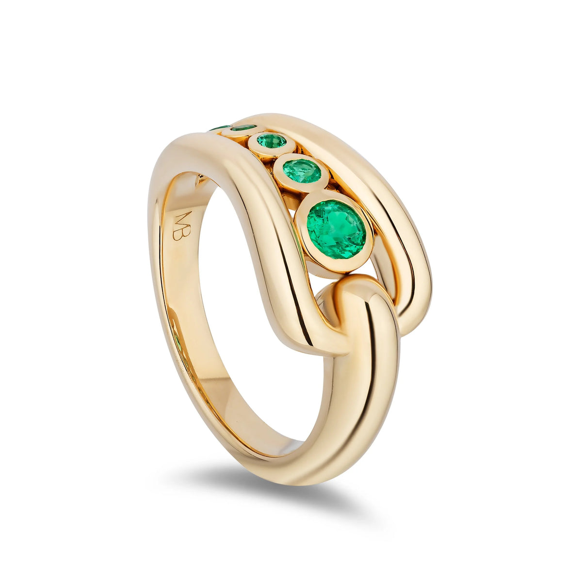 A yellow gold ring with a curved, interlocking chain-like design, featuring three bezel-set round green emeralds gemstones on the top, shown on a white background.