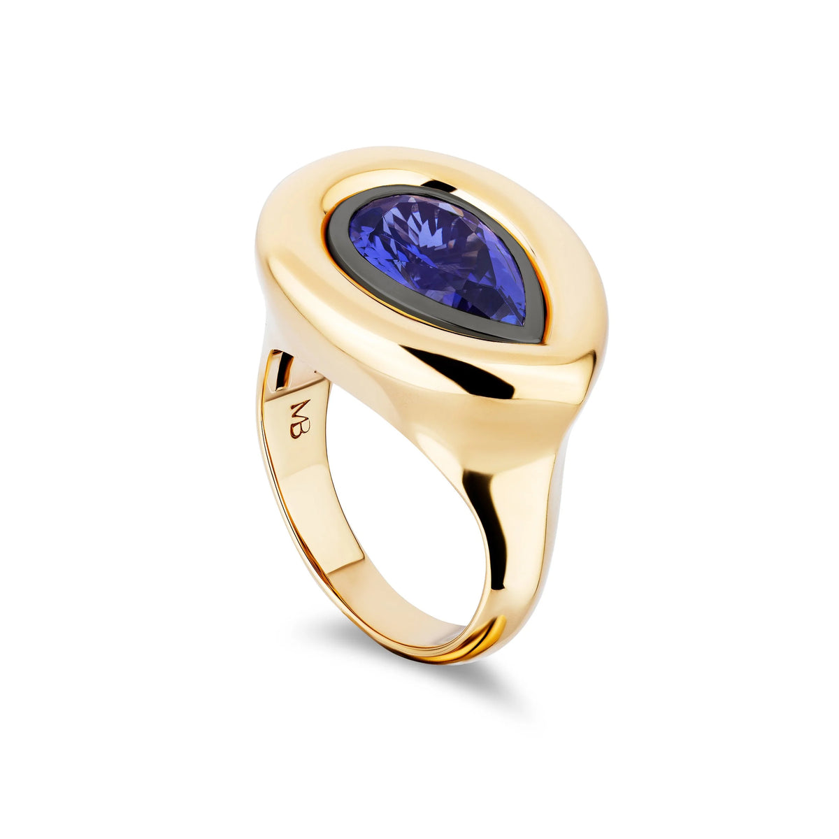 Gold ring with a blue gemstone on a white background
