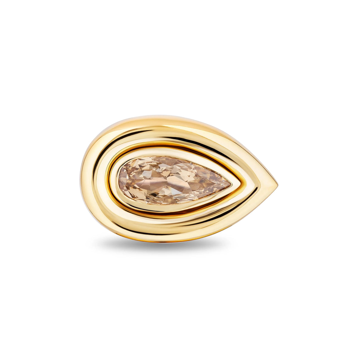 A gold teardrop-shaped ring featuring a central pear-cut clear gemstone, set against a plain white background.