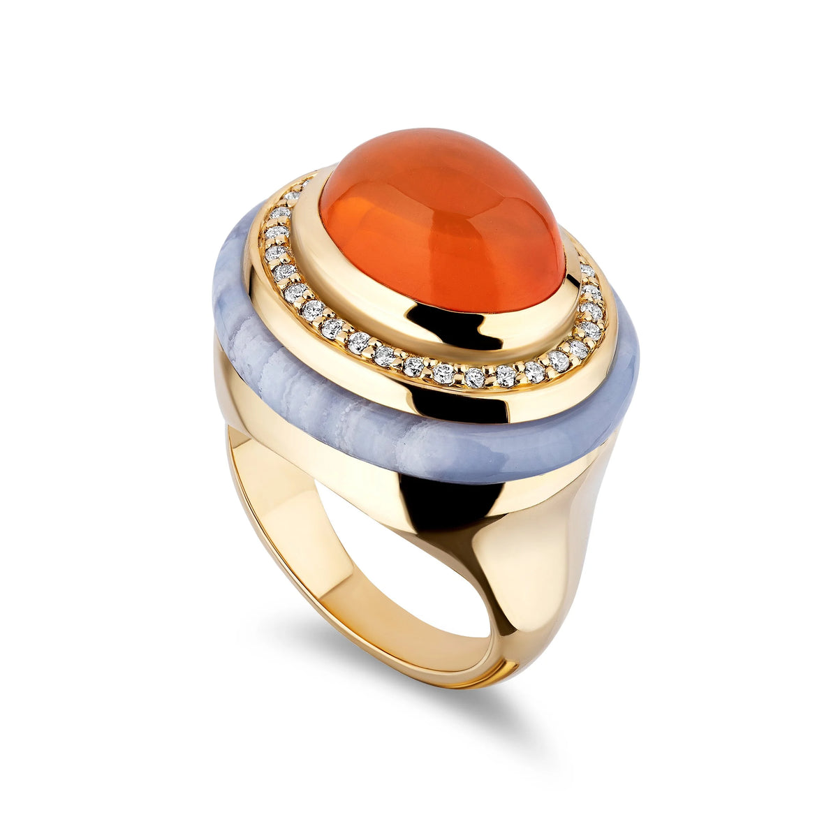 A gold ring featuring a large oval orange cabochon stone, surrounded by a halo of small clear diamonds and a light blue stone band, shown on a white background.