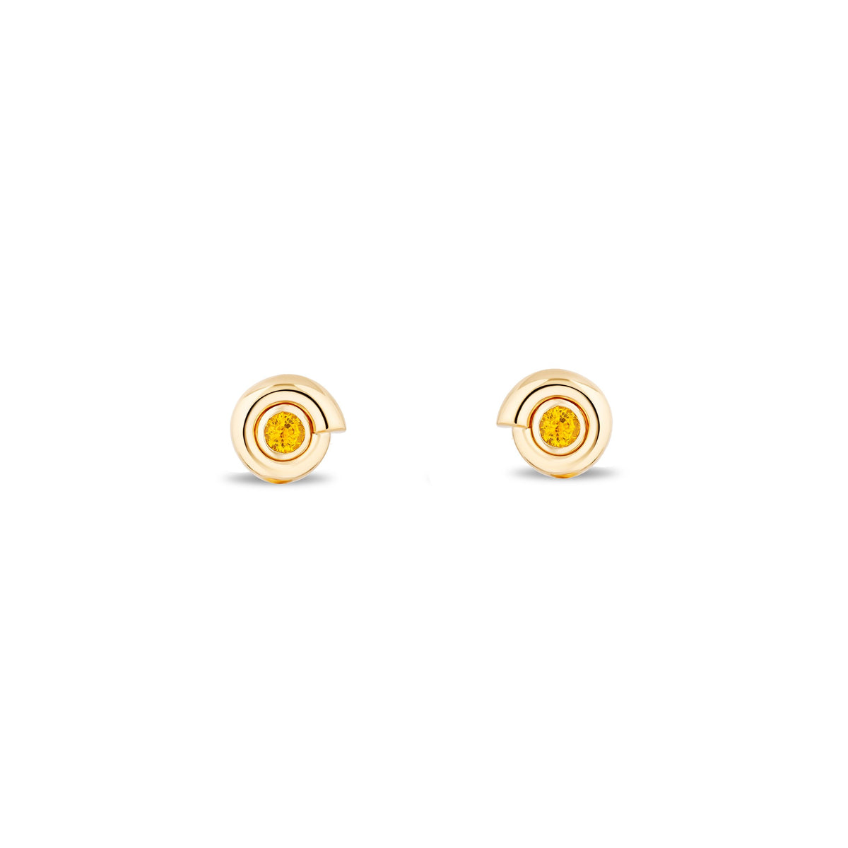 A pair of gold spiral stud earrings with a small yellow gemstone in the center, set against a plain white background.