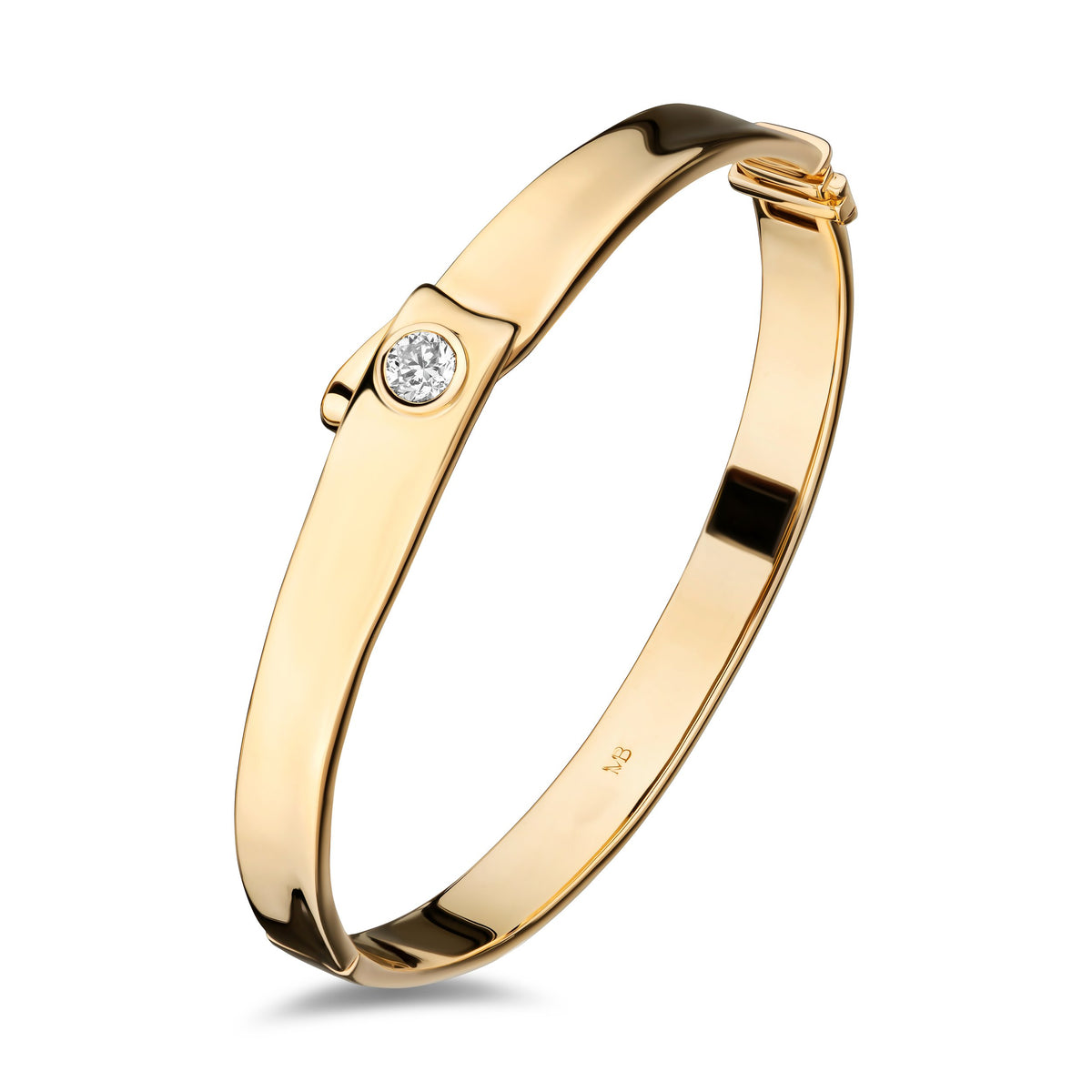 A polished yellow gold hinged bangle bracelet with a single round-cut clear gemstone set on the front, shown on a clean white background.