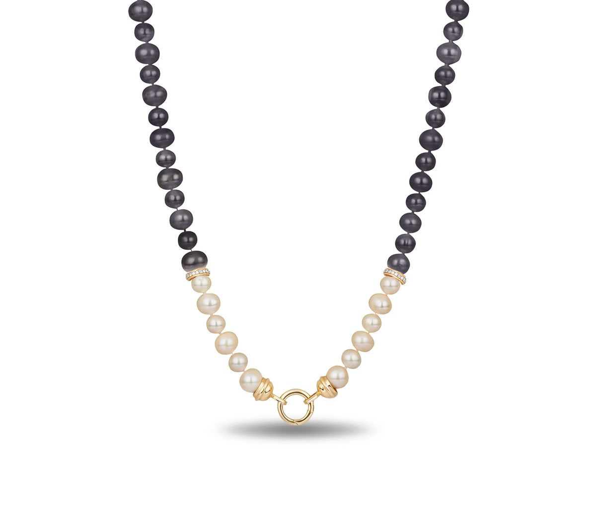 A pearl necklace featuring dark gray on one side and creamy white on the other, joined by a gold ring clasp at the center, shown against a plain white background.