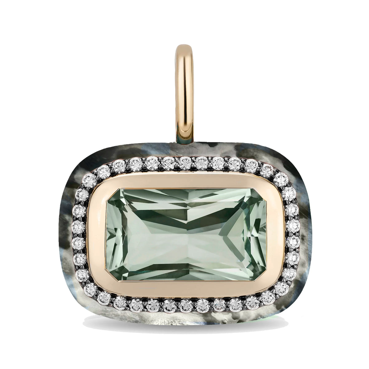 A rectangular emerald-cut green gemstone pendant with a halo of small clear stones and a gold-tone inner border, set on a textured gray outer border with a gold bail, shown on a white background.