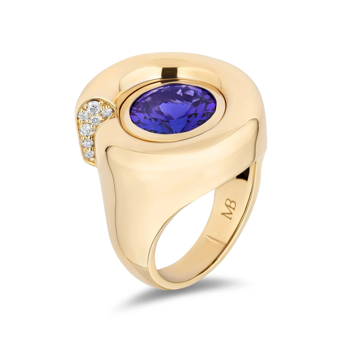 A yellow gold signet ring featuring a large oval purple tanzanite center stone and a curved row of small clear accent stones on the left, shown on a clean white background.