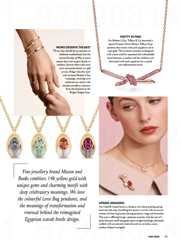 Page from a jewelry catalog featuring necklaces, pendants, and a brooch.