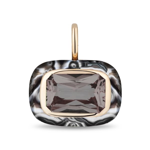A rectangular cushion-cut pendant featuring a faceted smoky gray gemstone in a gold bezel setting, surrounded by a black and white marbled outer border with a gold bail, shown on a white background.