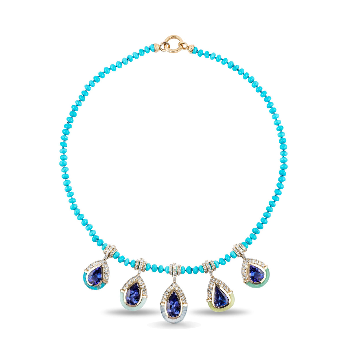 A beaded necklace with small turquoise-blue beads and five teardrop-shaped blue gemstone pendants in silver-toned settings with gold-toned accents, shown on a white background.