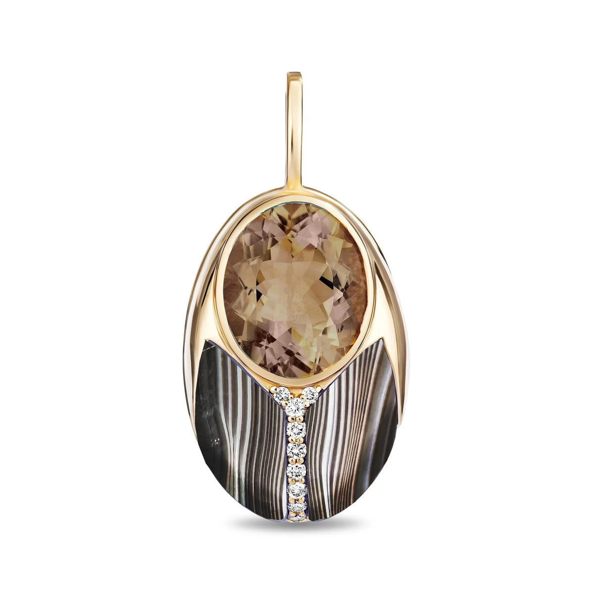 An oval pendant featuring a large faceted brown smoky quartz gemstone, a polished gold-tone border, and a lower section with black and white striped agate inlay and a small line of diamonds, shown on a white background.