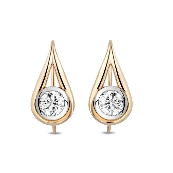 A pair of gold and white gold teardrop-shaped stud earrings, each featuring a round-cut diamond in a bezel setting, shown against a plain white background.