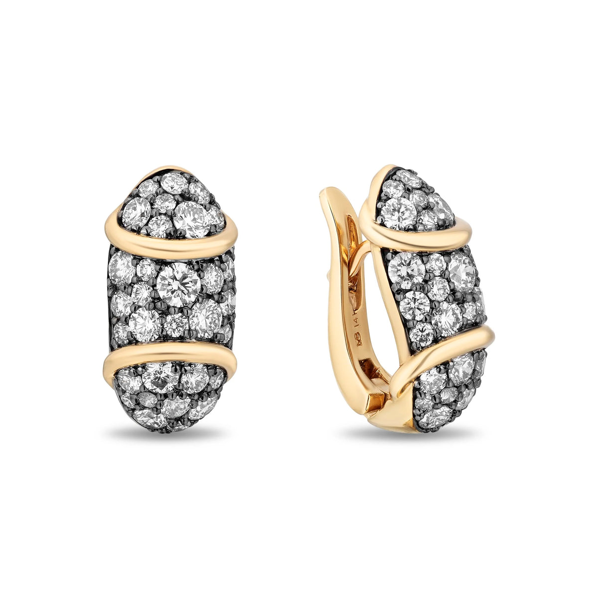 A pair of gold and diamond huggie hoop earrings shown on a clean white background, with one earring facing forward and the other angled to show the side profile and hinge.