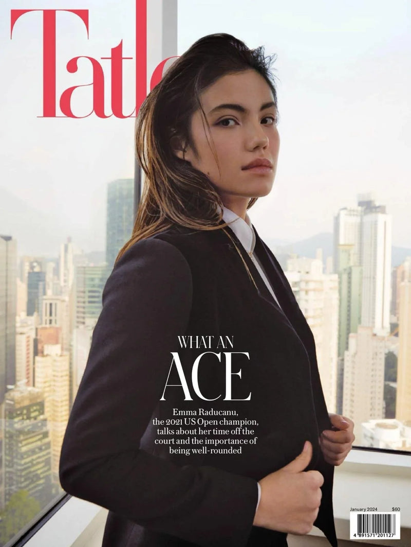 Emma Raducanu, 2021 US Open champion, in a black suit, on the cover of Elle magazine January 2024.