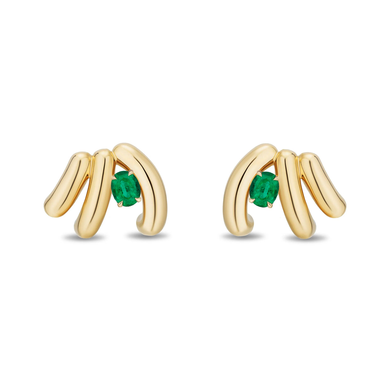 A pair of gold stud earrings featuring a polished curved bar design with a small round-cut green emerald gemstone at the center, set against a plain white background.