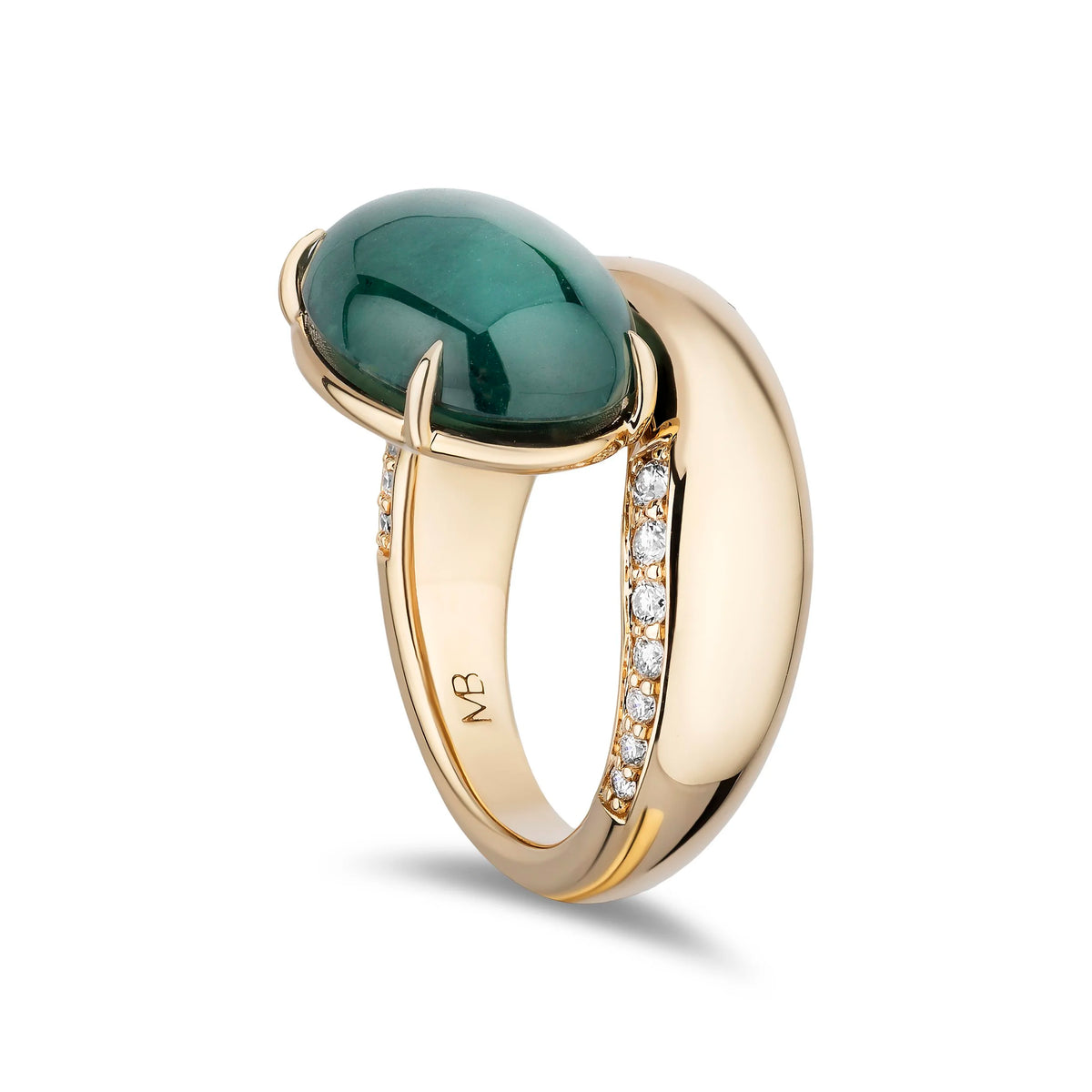 A gold ring featuring a large oval dark green cabochon gemstone and a pavé-set row of clear stones on the band, shown on a white background.