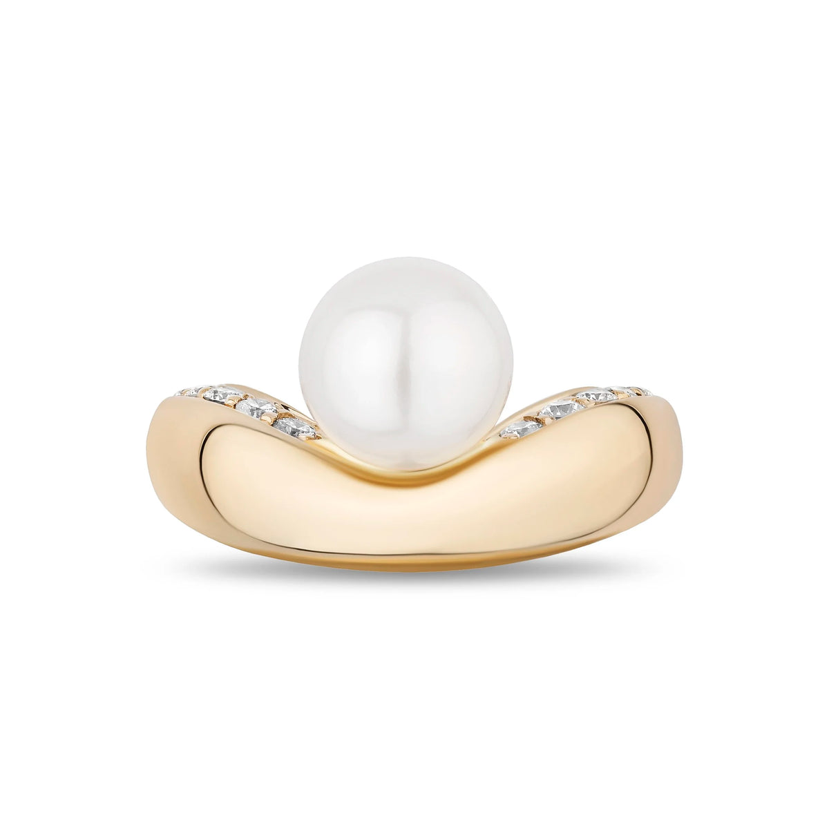 A yellow gold ring featuring a large, lustrous white pearl nestled in a curved setting with small pavé-set diamonds, shown on a clean white background.