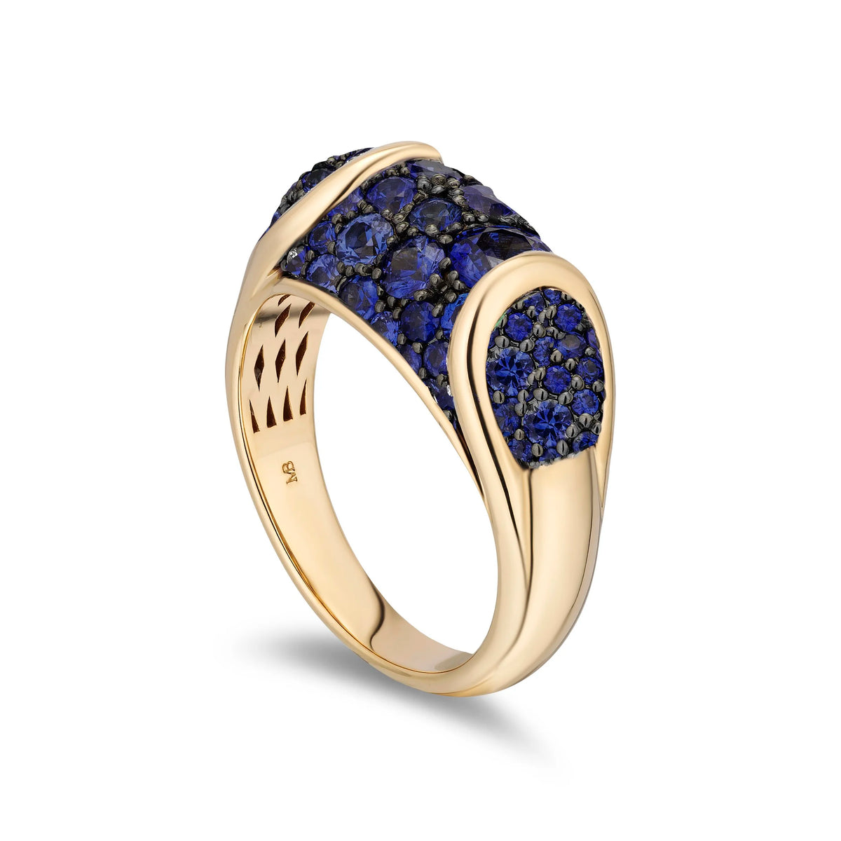 A yellow gold ring featuring a curved top set with deep blue pavé gemstones, shown on a clean white background.